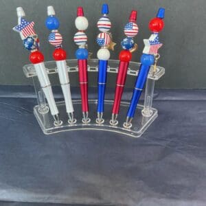 A display of patriotic pens and pencils.