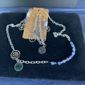 A necklace with some charms on it