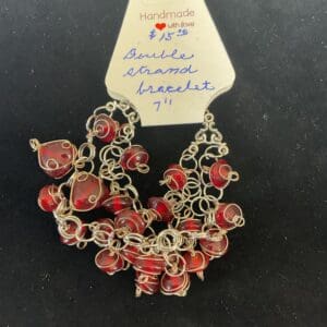 Handmade red glass bead bracelet.
