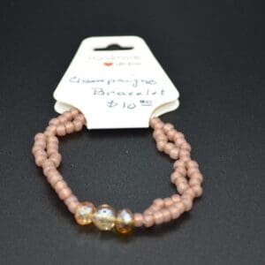 Champagne beaded bracelet, $10.00.